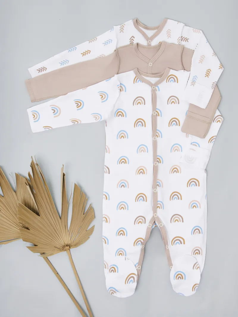 Baby sleepers with dried palm fan leaves, boho aesthetic