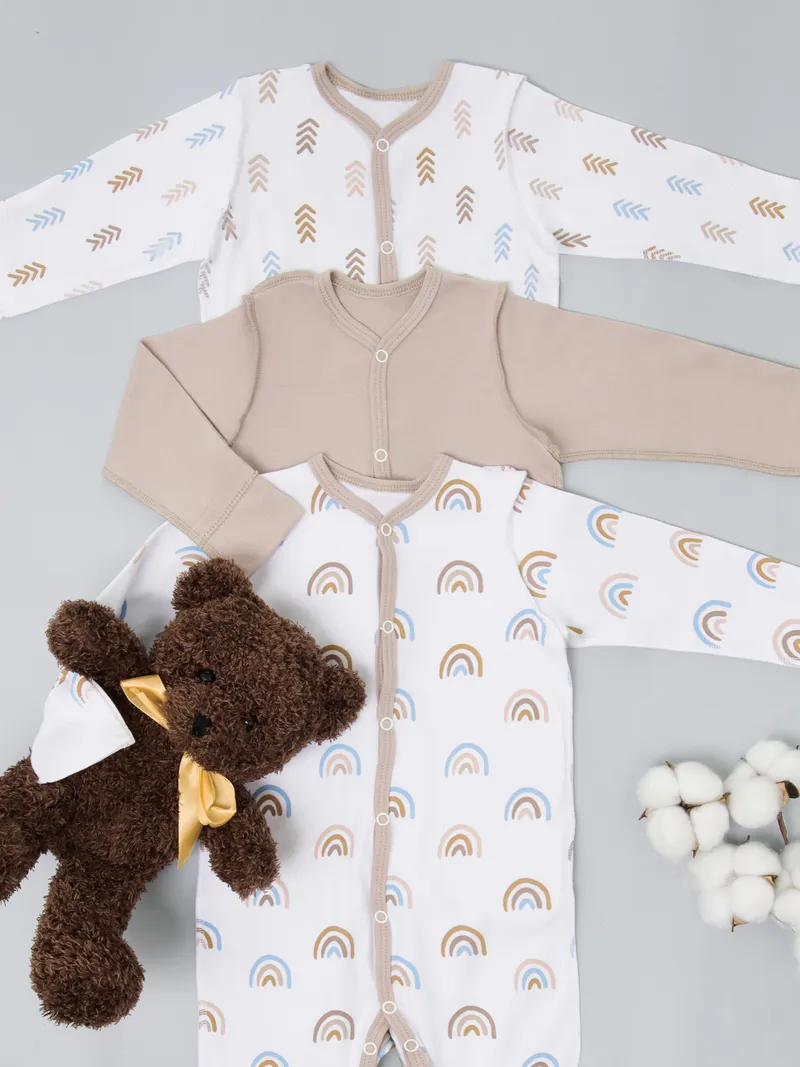 Baby sleepers with brown teddy bear with yellow ribbon, cotton branch