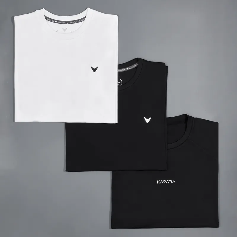 KAVARA brand t-shirts flatlay: white with black V logo, two black with V logo and KAVARA text, clean minimalist presentation