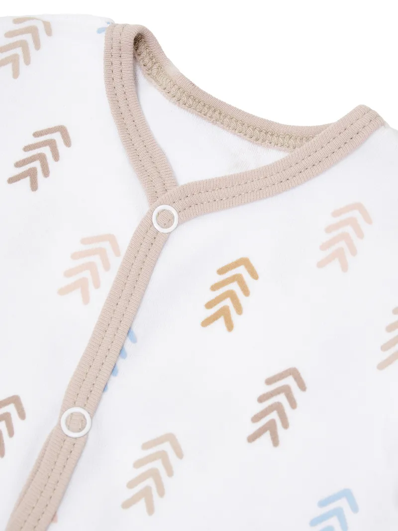 Detail shot baby bodysuit white with arrow pattern beige ribbed trim snap closure quality focus